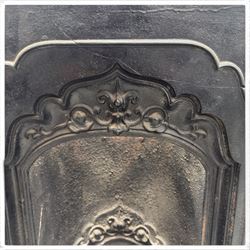 Three cast iron fireplace fittings, comprising a Regency-style fire grate with sunburst crest, urn finials, bowed basket and scroll supports (W58cm H63cm); Victorian fender with pierced acanthus frieze and foliate base (W64cm H20cm); Gothic Revival fireplace with fleur-de-lis crest, arched surround and integral fire basket (W41cm H87cm)