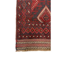 Meshwani red and blue ground runner, decorated with five lozenge medallions, overall geometric design