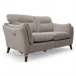 Ashwood - ‘Calypso’ 2-seater motion lounger, upholstered in light stone grey textured fabric with flared arms and split back cushions, fitted with dual electric recline controls, raised on stained tapering legs