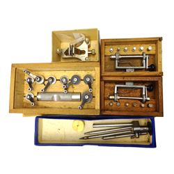 Collection of horologists/watch maker's tools and equipment including Tour a Pivoter, Staking tool by Kendrick & Davis patented Aug 26 1902, mainspring winders, two depthing tools, Poising tool, Witschi timegrapher (no power lead), Keeler optician glasses and collection of watch parts including cock balancers, hands, roller jewels etc
