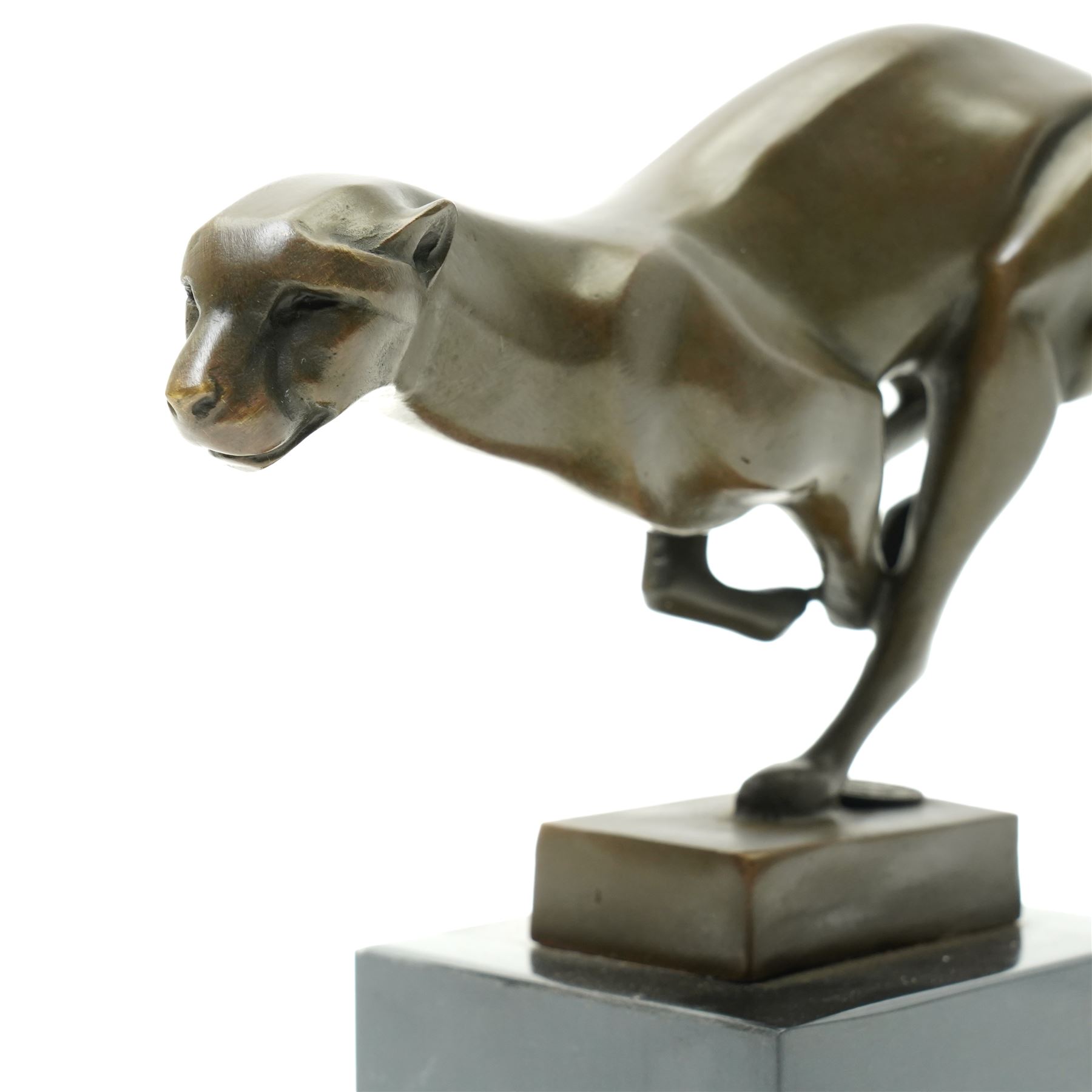 After Milo - Bronze figure of a running Cheetah with foundry mark on a black marble base H20cm