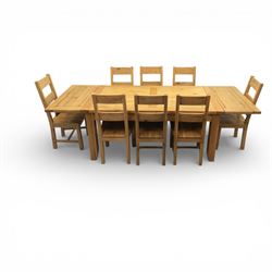 Modern light oak rectangular dining table, and eight high back chairs, stowable leaves extending to 270cm