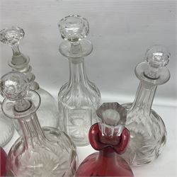 Collection of Victorian and later decanters, to include cut glass and cranberry glass example, and a cranberry glass jug with stopper