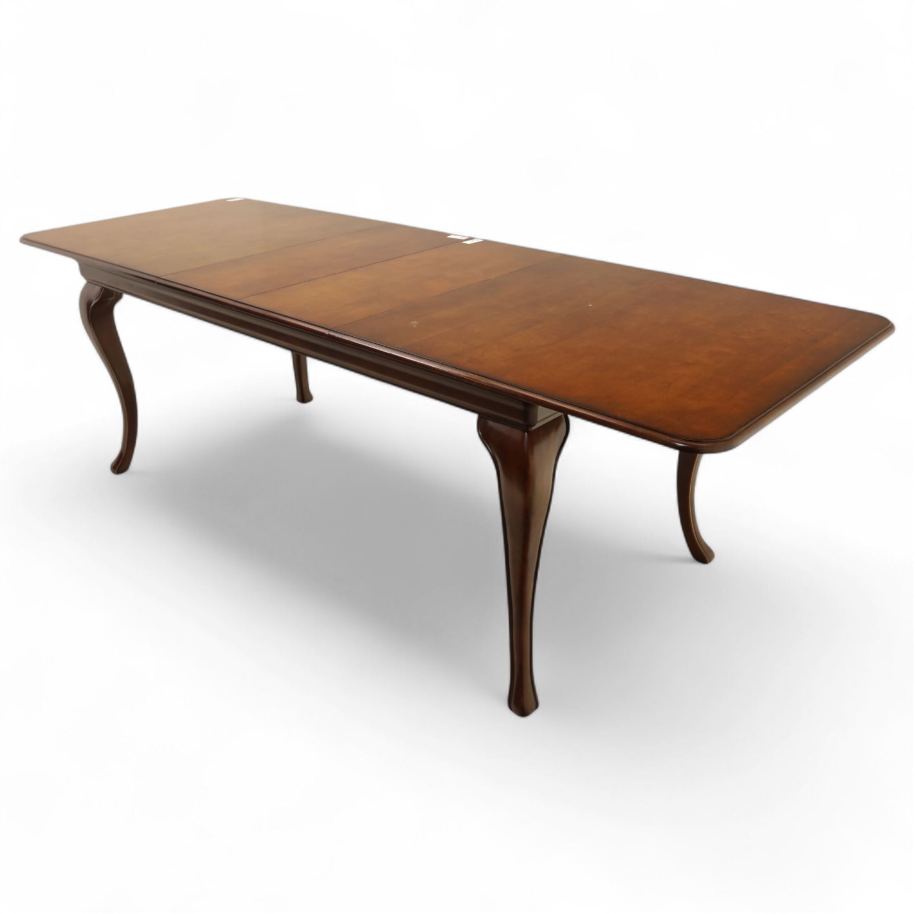 Willis & Gambier - mahogany extending dining table, rectangular top with rounded corners on cabriole legs, with two 35cm extension leaves, four Willis & Gambier upholstered high back chairs and four mahogany chairs, upholstered in a stripped multi-coloured velvet fabric, with scroll-shaped top rail, lyre-shaped back splat on cabriole legs, chairs W46xD91x97cm (11) 