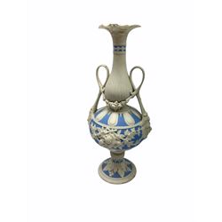 Victorian Parian ware twin handled vase detailed with Bacus masks fruiting vines and floral sprays H36cm, together with a Parian jug H14.5cm, classical Parian sculpture H40cm, decorative plaque decorated in high relief depicting two children D18.5cm. 