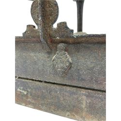 19th century cast iron hallway hat and coat stand, the arched frame decorated with overlapping foliage, central oval mirror surrounded by trailing oak leaves and acorns, with extending umbrella and stick stand, the curved plinth base decorated with acanthus leaves, with impressed and mounted R.d. lozenges