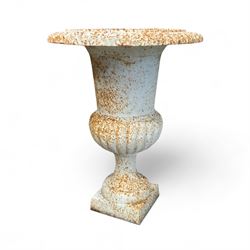 Pair of Victorian design painted cast iron garden urns, egg and dart rim, tapering column on pedestal base