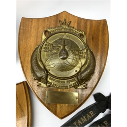  Two Submarine Force US Atlantic Fleet presentation plaques, the first detailed Subron 14, the second USS Abraham Lincoln 602, each H32.5cm, together with five uniform patches, four cap tallies, detailed HSM Tamar (x3), and HMS Ganges, and a set of two limited edition Euro Tunnel commemorative presentation plaques, The Breakthrough 1st December 1990 and Celebration 6th May 1994, D27cm, complete with original certificates.  
