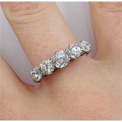 Early 20th century five stone old cut diamond ring, stamped Plat, total diamond weight approx 1.75 carat