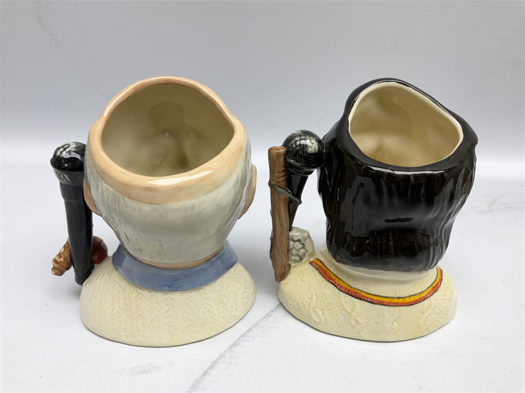 Royal Doulton limited edition figure of Geoffrey Boycott O.B.E, HN3890, no 253/8114, together with four Royal Doulton limited edition character jugs of cricket interest, comprising The Hampshire Cricketer D 6739, no 3903/5000, Freddie Trueman O.B.E, D 7090, no 502/9500, Brian Johnners Johnston, D 7018, no 1281/9500 and Len Hutton D 6945 no 263/9500, four with certificates, one with box