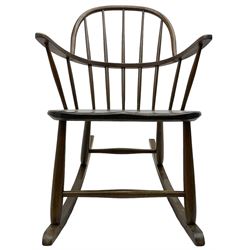 Mid-to-late 20th century beech rocking chair, double hoop and stick back, on turned supports united by rockers and swell turned stretchers