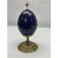 Franklin Mint House of Faberge three collectors eggs, comprising A king is born, We three kings, The flight into Egypt