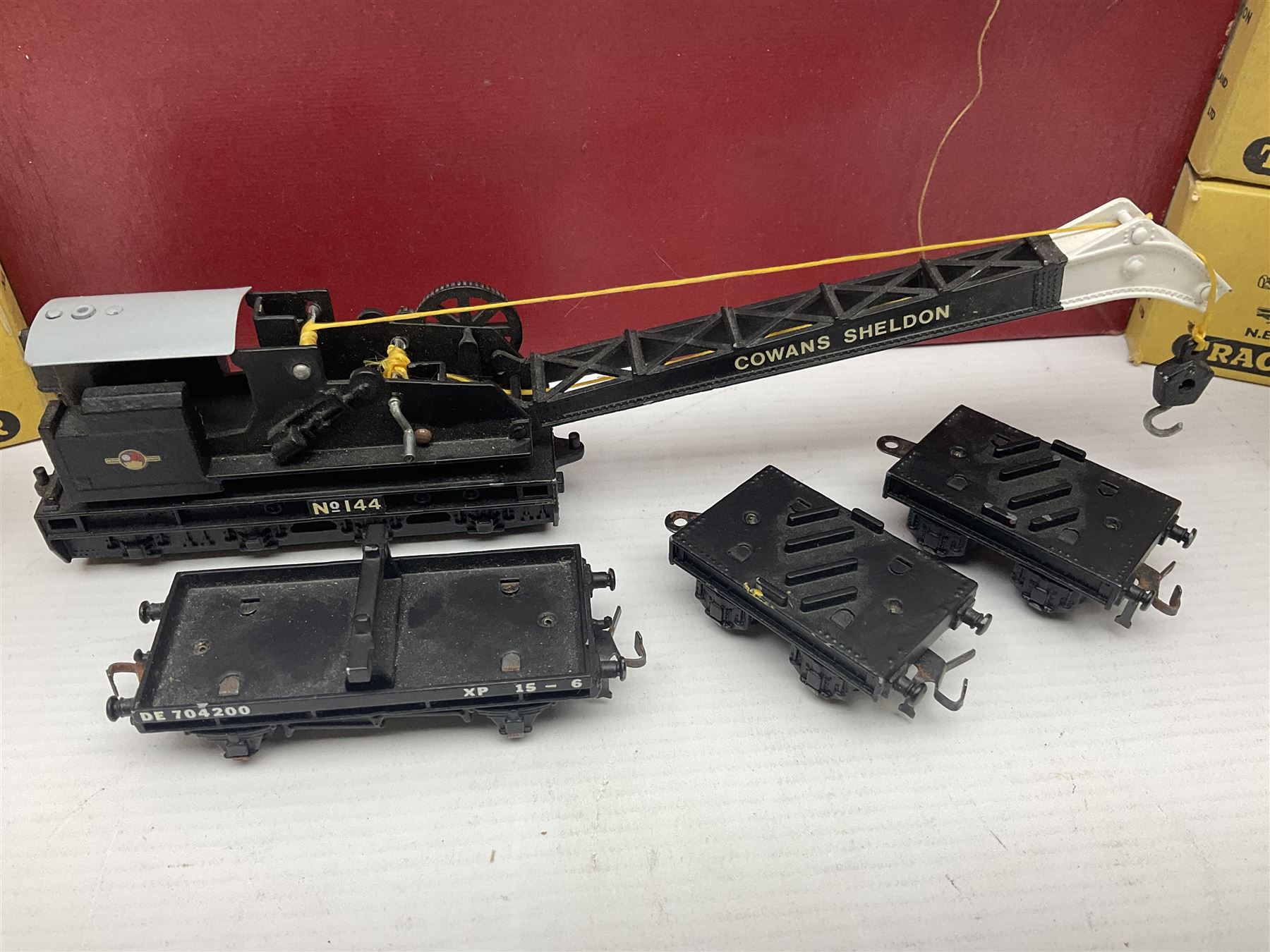 Hornby Dublo - 4620 Breakdown Crane No.133 in red with Match Trucks; boxed; another unboxed 4620 Breakdown Crane No.144 in black 'Cowans Sheldon' with Match Trucks; and nine Trackmaster goods wagons comprising three GW Open Wagons, two GW box vans, three NE Open Wagons and one NE Box Van; all boxed (11)