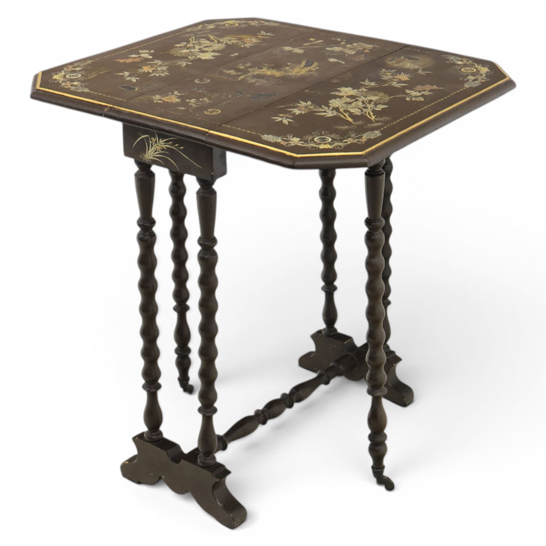 Chinoiserie style gate leg table, with gilt painted floral design, raised on bobbing supports, on sled feet