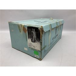 Lladro figure, Sad Parting, modelled as a man and woman with suitcases, sculpted by Francisco Catalá, with original box, no 5583, year issued 1989, year retired 1991, H33cm