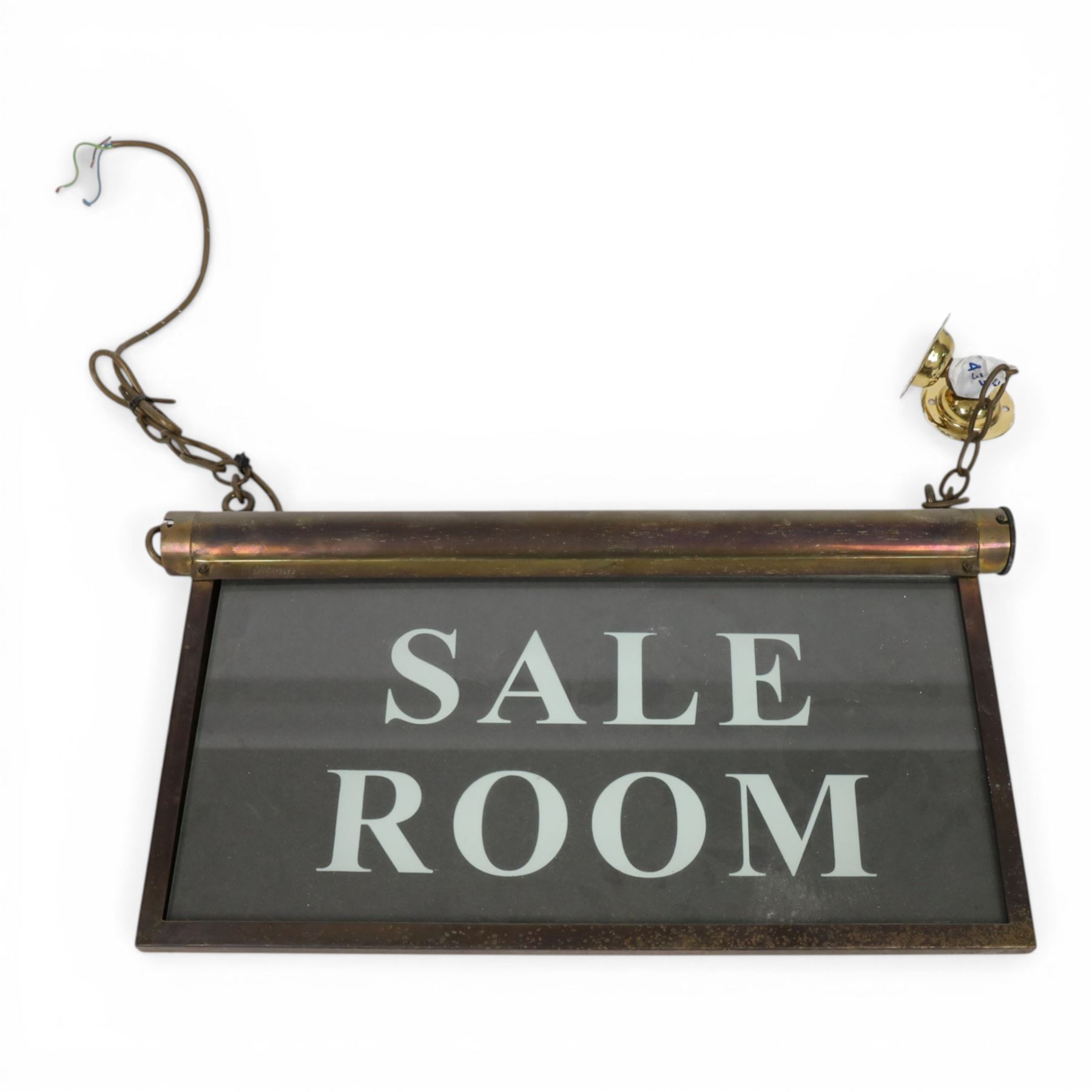 Early 20th century brass ceiling hanging illuminated sign 'sale room', H27cm, L48cm