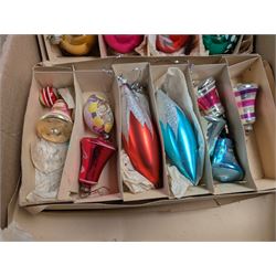 Collection of colourful vintage Christmas decorations, including glass and metal baubles