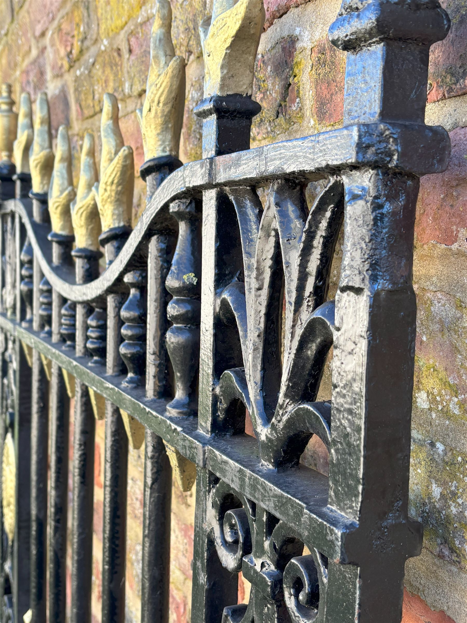 Wrought iron pedestrian gate of excellent quality, early 19th century, with urn and torch finials above floral motifs and twin paterae. H147cm, W122cm. - COLLECTION BY APPOINTMENT FROM: The White House, Thirsk Road, Easingwold, York, YO61 3NF - CALL 01723 507111 TO ARRANGE