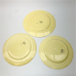 A Clarice Cliff Bizarre by Wilkinson/Newport Pottery vegetable tureen and cover, dinner plate and two dessert plates in the Ravel pattern. (4).