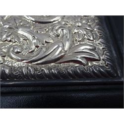 Modern silver mounted leather writing case, with repousse floral and foliate decoration to the silver cover, hallmarked Laurence R Watson & Co, Sheffield 1991, H29.5cm, boxed
