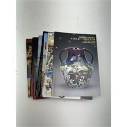 Three Moorcroft reference books, comprising Winds of Change, The Phoenix Years and A New Dawn, together with a collection of Moorcroft magazines 