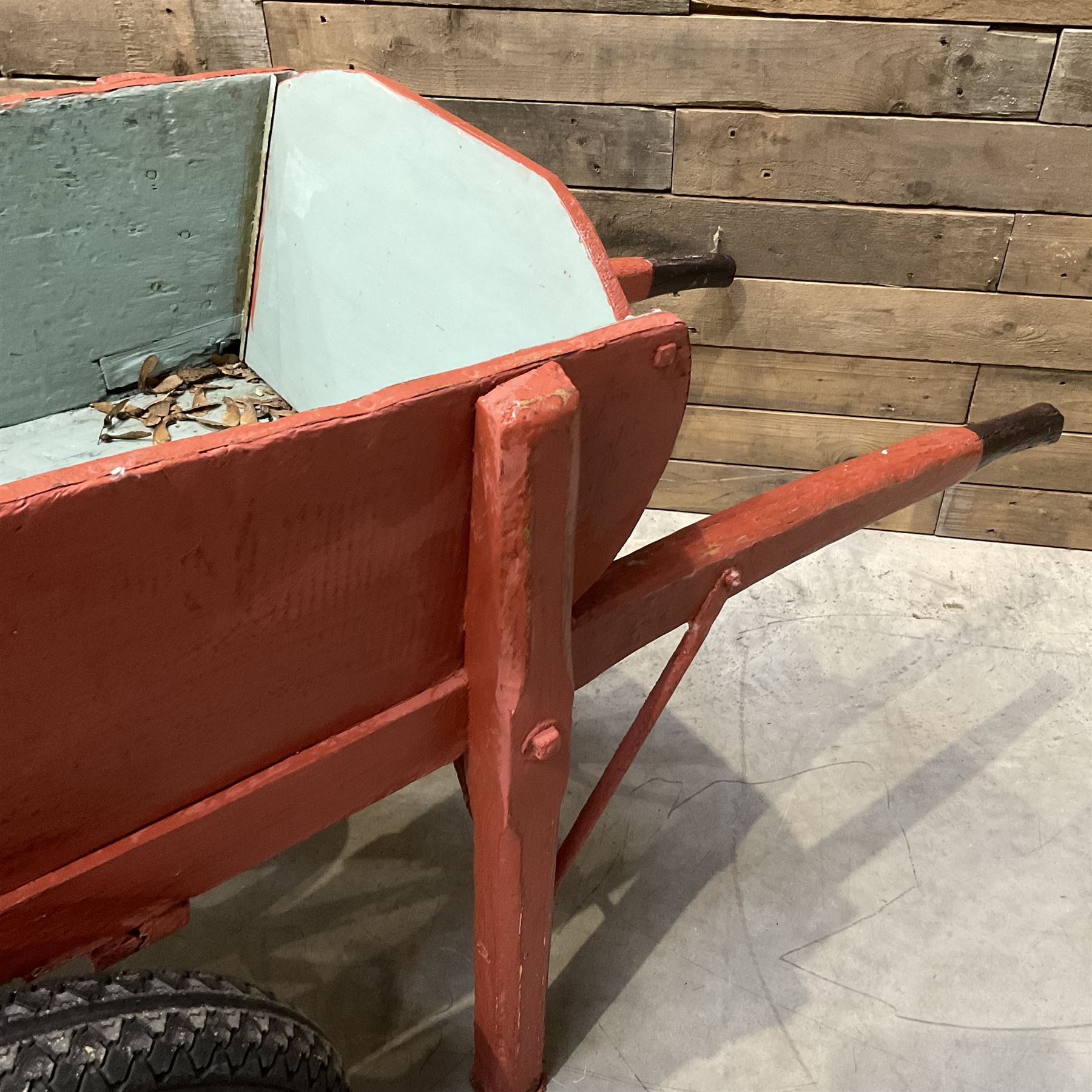 Painted timber hand cart on cast iron wheels
