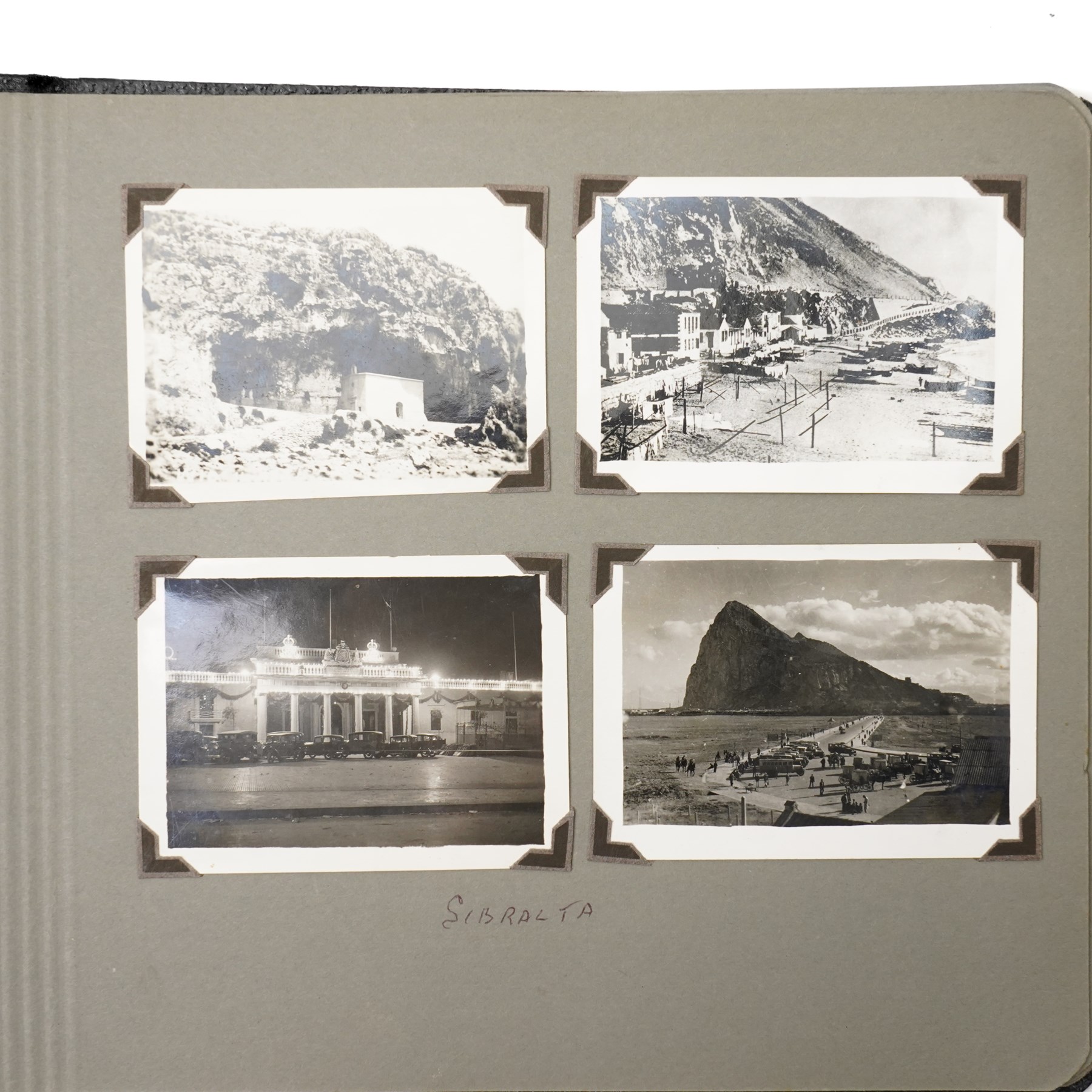 WWII photo album of Malta containing original photographs with annotations, including Battle ships, harbours, soldiers and buildings, together with Manual of Naval Cookery 1945 Naval book