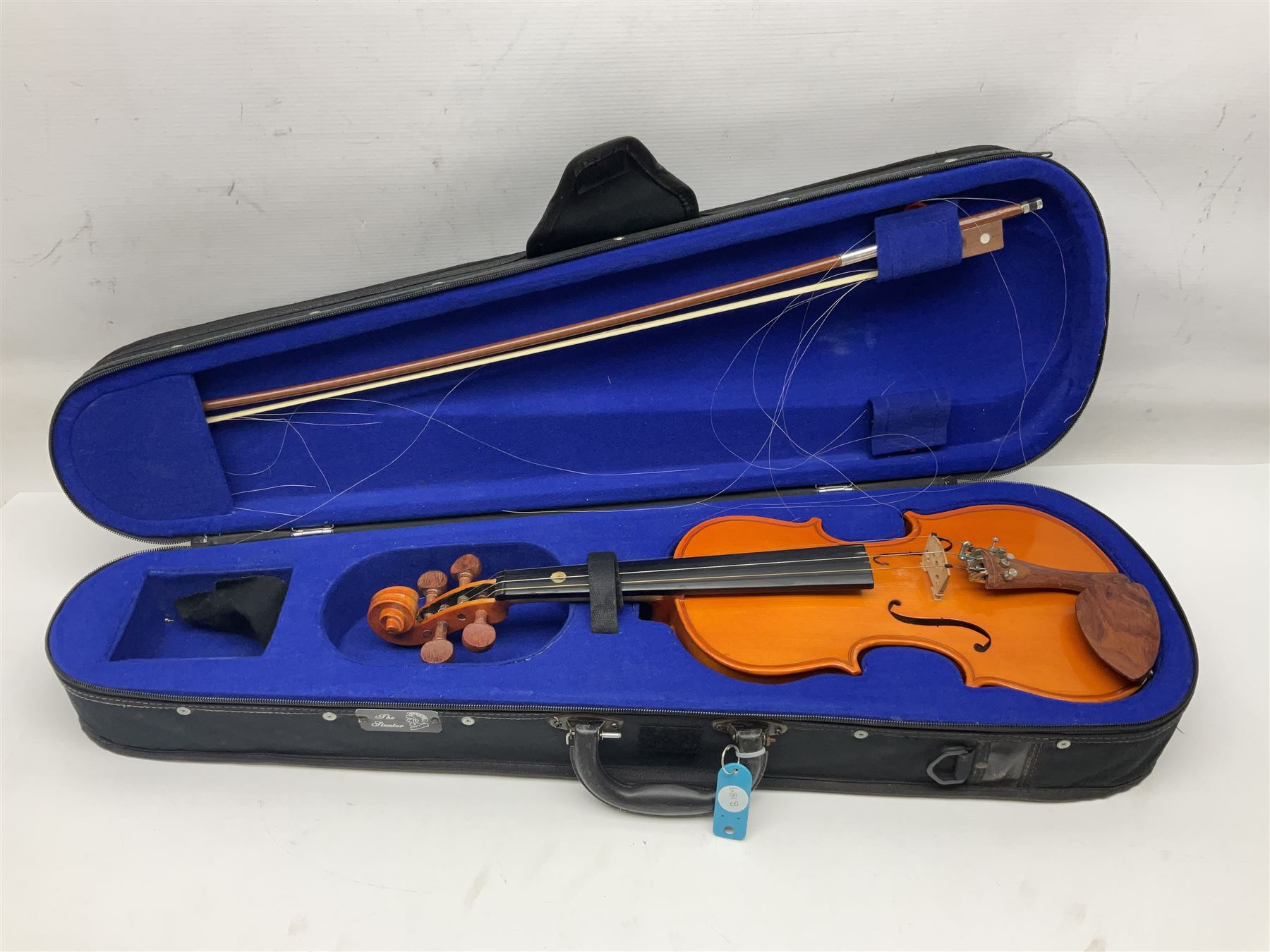 Three Stentor Student violins - three-quarter size with 33cm two-piece back; and two quarter size each with 28cm two-piece back; each in carrying case with bow (3)