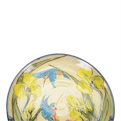 Paul Jackson Studio Pottery dished plate, decorated with Kingfishers and Koi fish amongst yellow irises, D26cm, together with a Paul Jackson Studio Pottery mug, of bellied form decorated with fruits, H11cm, each signed and dated 1996 and 1994