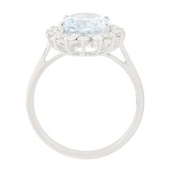 18ct white gold aquamarine and diamond cluster ring, single oval cut aquamarine of approx 2.25 carat, surrounded by sixteen round brilliant cut diamonds, stamped 18K, total diamond weight approx 0.50 carat
