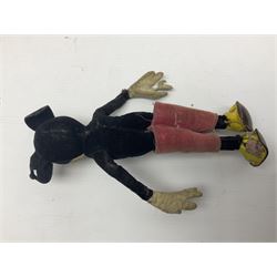 Deans Rag Book Mickey Mouse soft toy, circa 1930's, black velveteen head and body, with cream face and hands, red shorts and yellow felt shoes with leather soles, marked Reg. No. 750811 to neck H20cm; mid-20th century woodwool filled plush covered teddy bear with revolving head, applied eyes, vertically stitched nose and mouth and jointed limbs H52cm; soft toy figure of Rupert Bear; and Japanese clockwork tin-plate and plush covered mechanical toy of a gnome riding a donkey (4)