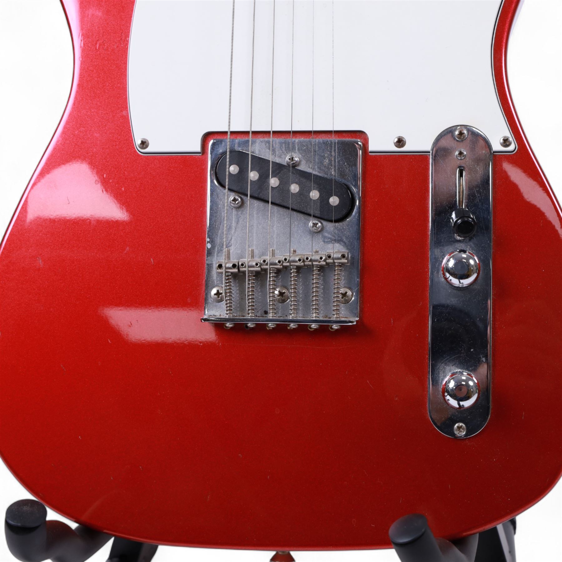 Fender Telecaster electric guitar, serial no. T021384 made in Japan c.1994, with Candy Apple Red body, white scratch plate and maple neck, guitar L98cm