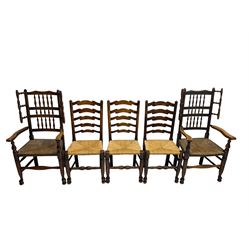 Harlequin set of nine country elm and beech chairs - pair 19th century spindle back carver armchairs with wingbacks, and a mixed set of seven ladderback side chairs, all with rush seats