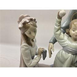 Two Lladro figures, comprising A Christmas Wish no 5711, and A Loving Family no 5848, both with original box, largest example H27cm