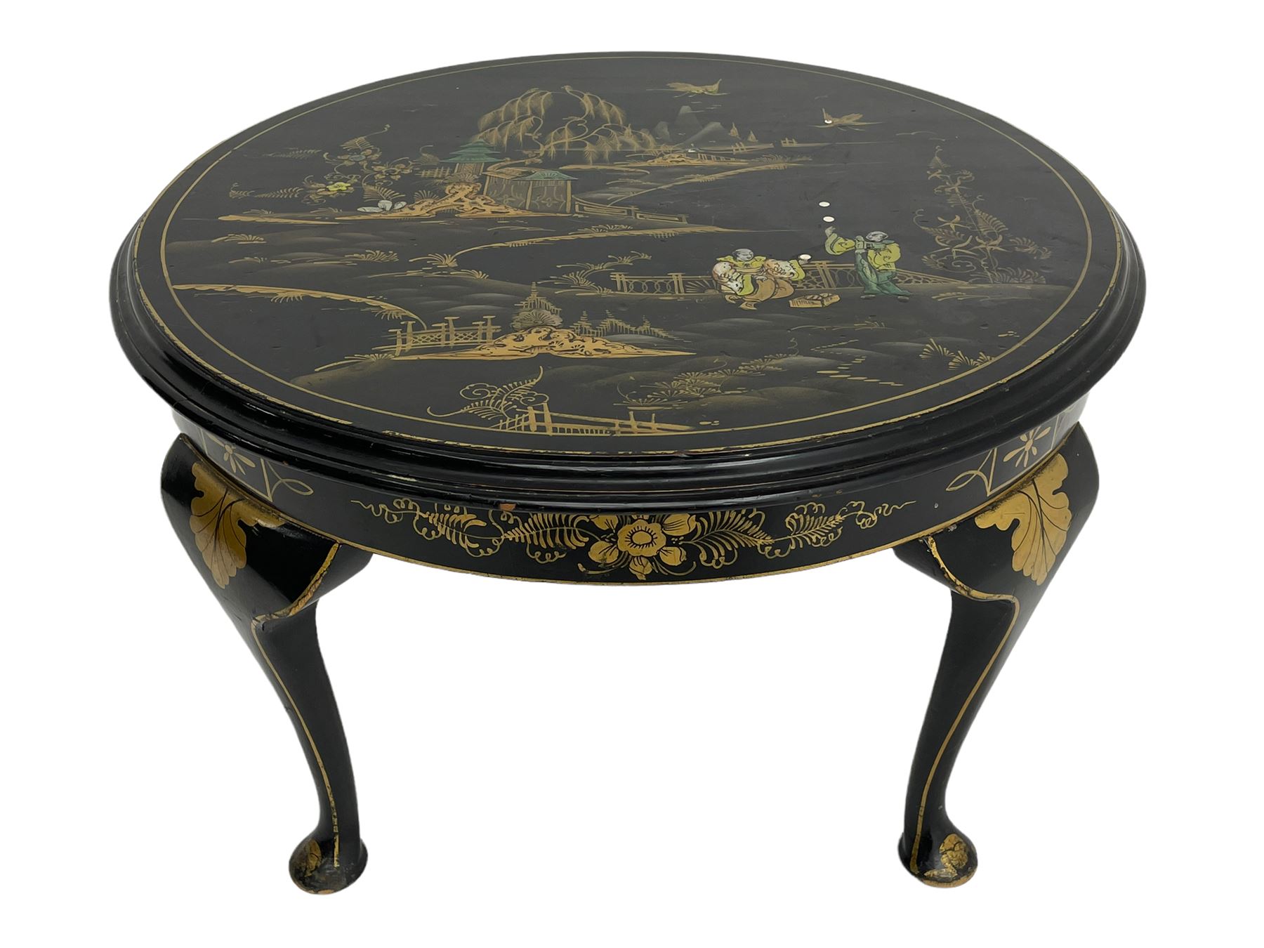 Early 20th century Chinoiserie lacquered circular occasional table, raised gilt decoration depicting traditional landscape scenes, on cabriole supports