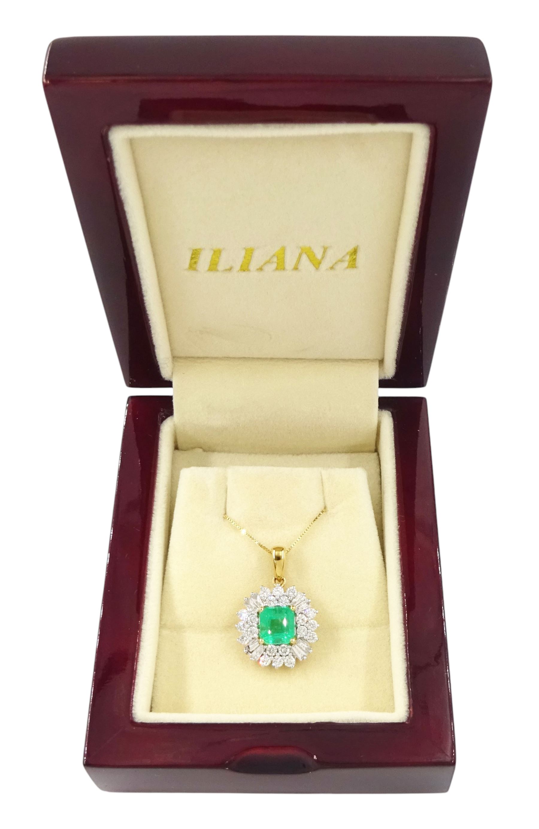 18ct gold Colombian emerald and diamond cluster pendant by Iliana, single octagonal cut emerald of 1.65 carat, surrounded by two rows of twenty round brilliant cut diamonds, spaced by eight tapered baguette cut diamonds, hallmarked, total diamond weight 0.96 carat