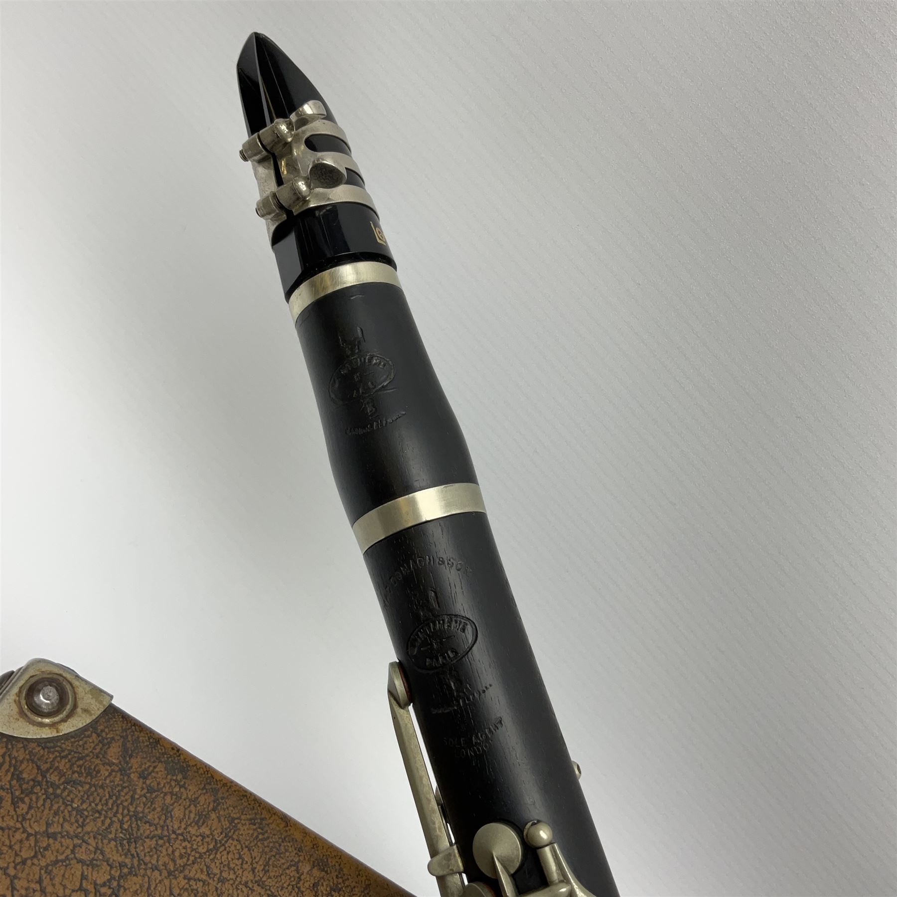 Buffet Crampon Paris African blackwood four-piece clarinet with nickel fittings, impressed 'BCPB 1937', multiple stamps for 'Macdonough & Son Sole Agent London' L67cm; in rexine covered case with two unused reeds. Biographical information: The Macdonagh family have links with the Royal Philharmonic Orchestra and are also reputedly linked with Thomas Macdonagh who was involved in the 1916 Irish uprising.