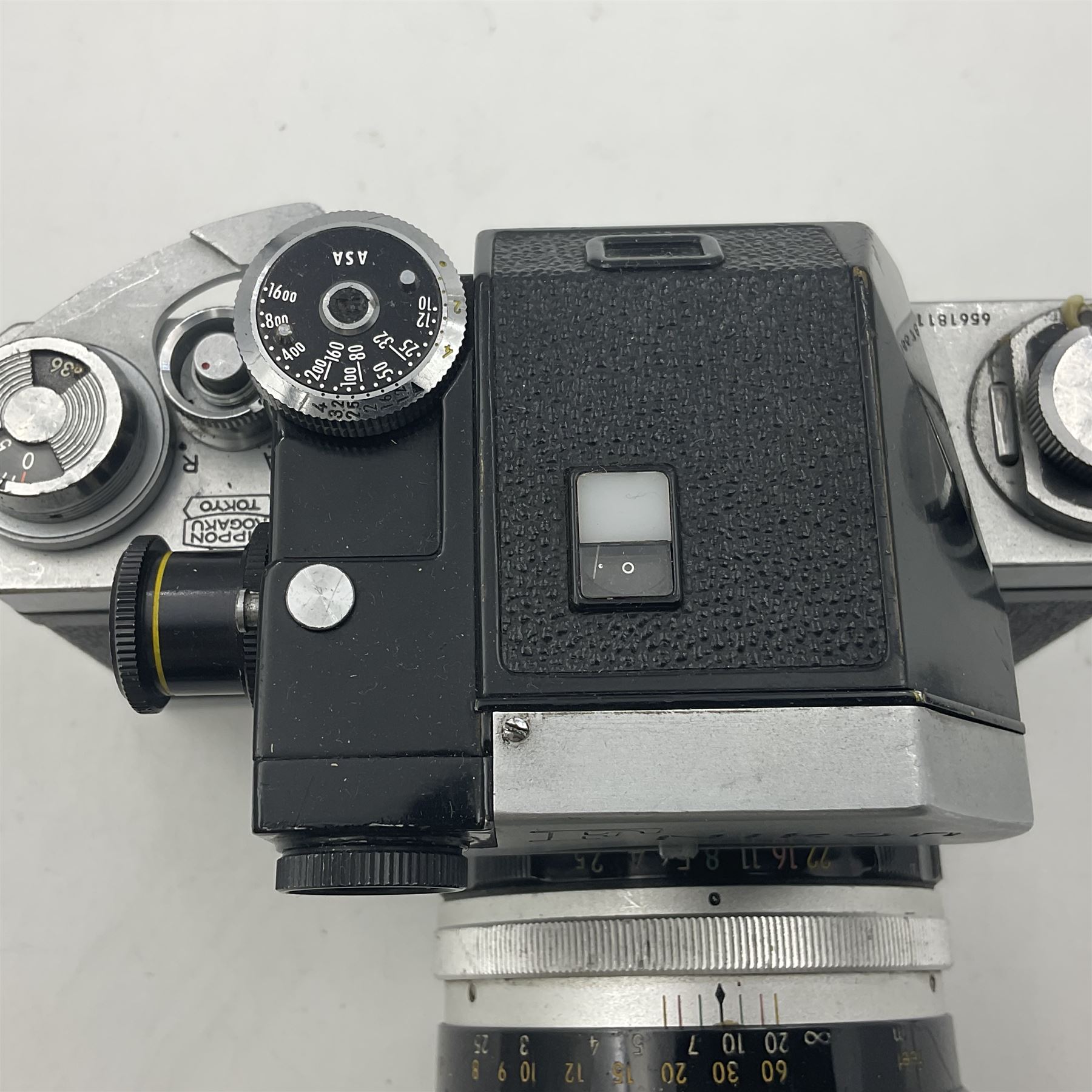 Nikon F Photomic NKJ camera body, marked 'US Dept of Defense ... U.S.A.F DA Nang, serial no. 6561811, with 'Nippon Kogaku NIKKOR-P Auto 1:2.5 f=105mm' lens, serial no. 212154