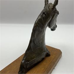 After Sydney March, bronze figure of horses head, wupon a wooden plinth, H17cm