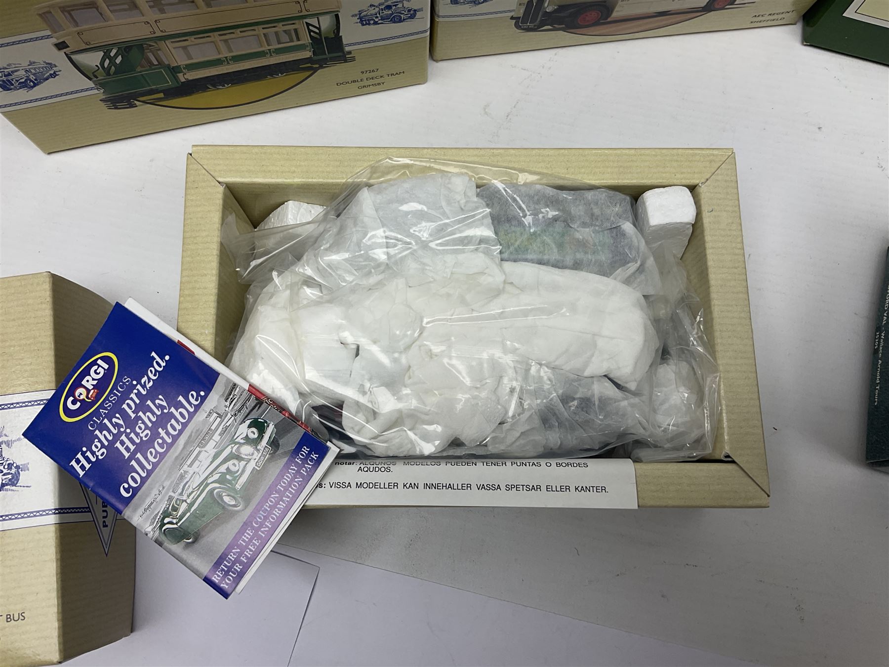 Corgi - twenty eight modern die-cast model coaches, buses and wagons to include Corgi Classics 35305, 96991, 97002, two 97108, 97208, 97267, 97335, 97871 and 98162; limited edition sets D949/26, 97107 and 97185; The Yorkshire Rider Series 91700, 91853, 91858 and 91862; all but one in original boxes or perspex display cases, most with certificates (27)