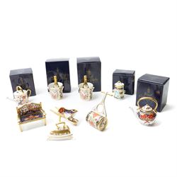 Collection of Royal Crown Derby miniature wares in Imari type patterns, comprising two cha...