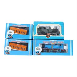 Collection of model railway locomotives, track and accessories, including Mettoy tin plate clockwork 0 gauge locomotive, tender and three coaches, boxed Hornby 00 gauge Thomas the Tank engine locomotive and two wagons, loose 00 gauge rolling stock and track and some kit built buldings, etc