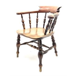 Early 20th century elm smokers bow captains chair, turned supports joined by double’H’ stretcher 