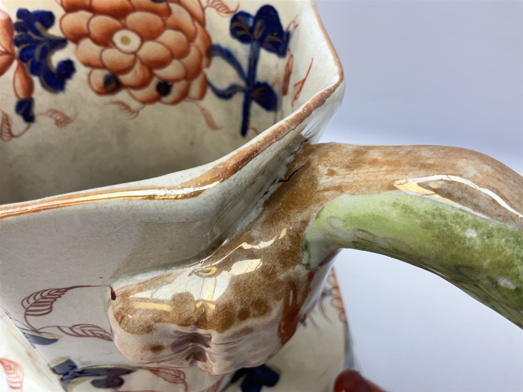 19th century ironstone wash jug and bowl set decorated in the Imari palette, together with two further smaller ironstone jugs similarly decorated, bowl D35cm