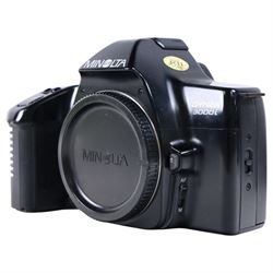 Minolta Dynax 3000i camera body, with three lenses including Sirius MC Auto Zoom 1:3.9 f=80-200mm, Minolta AF Zoom 80-200mm 1:4.5(22)-5.6 and Minolta AF Zoom 35-80mm 1:4(22)-5.6