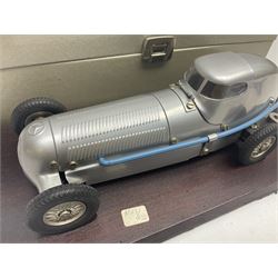 Marklin tin-plate clockwork Mercedes-Benz W25 racing car with driver in hinged cockpit model no.1096; fitted on mahogany base L33cm; in original metallic silver box with key