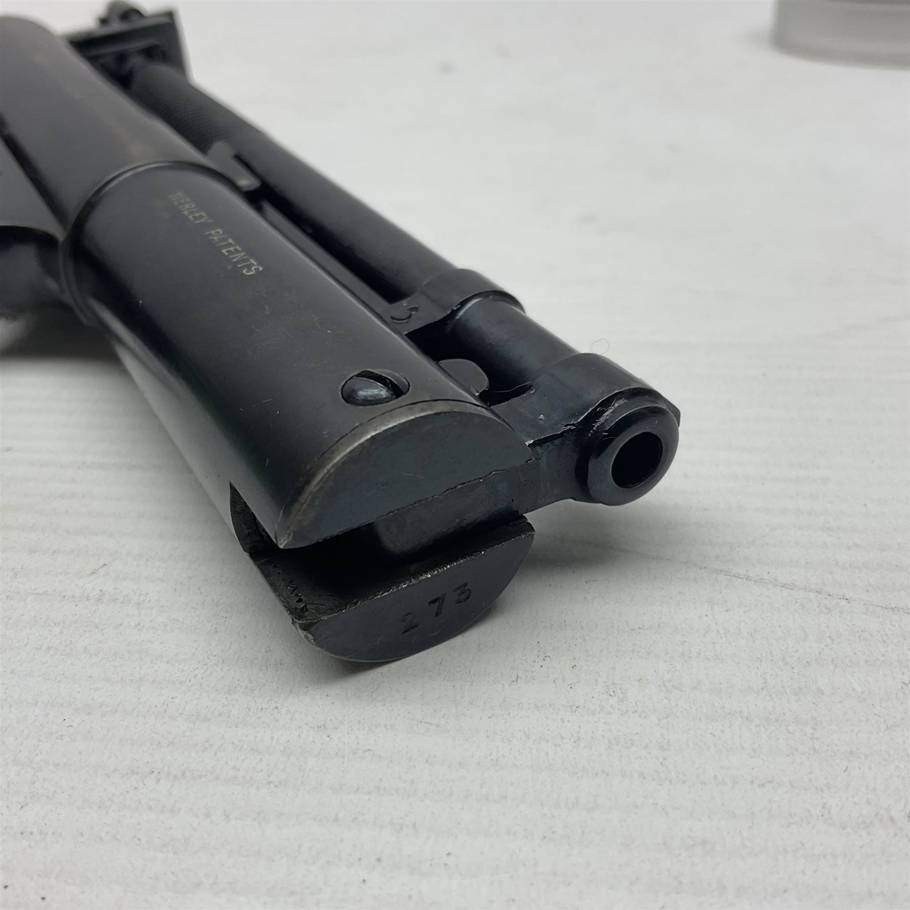 Webley Senior .22 cal. air pistol with top lever action, serial no.273; in original box with label under lid; together with two tins of pellets NB: AGE RESTRICTIONS APPLY TO THE PURCHASE OF AIR WEAPONS.