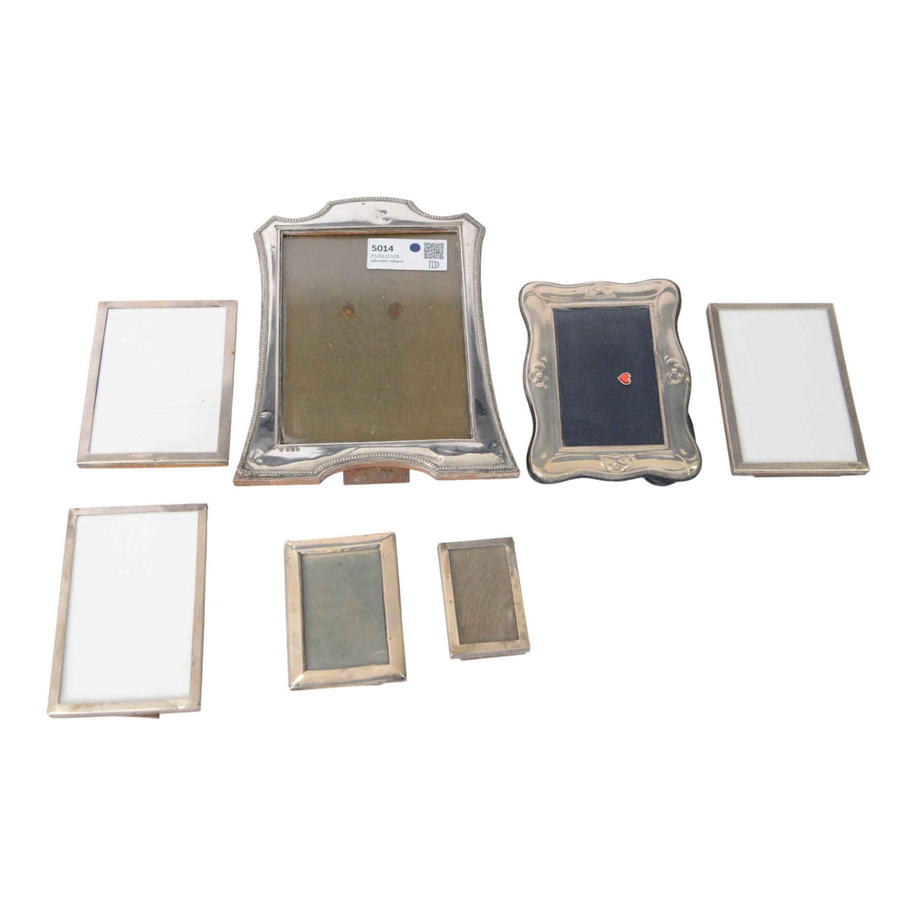 Seven silver mounted photograph frames, including pair of small rectangular examples, all hallmarked, tallest H