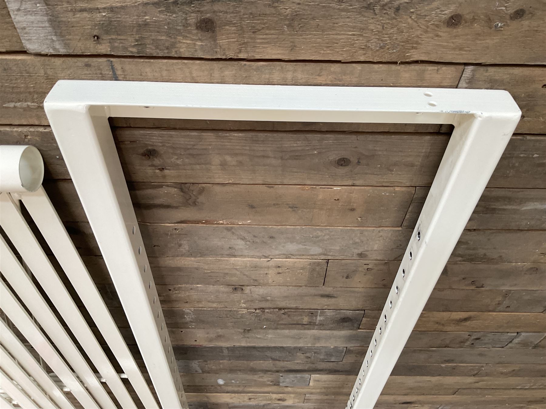 Commercial wall hanging rug display rack