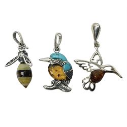 Three silver Baltic amber pendant, including kingfisher, bee and hummingbird 